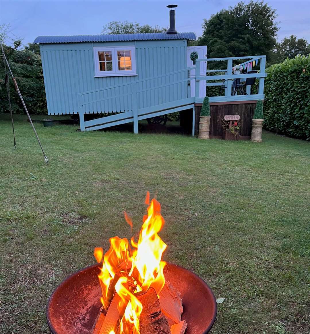 Getting the fire pit going in our own private area outside our accommodation