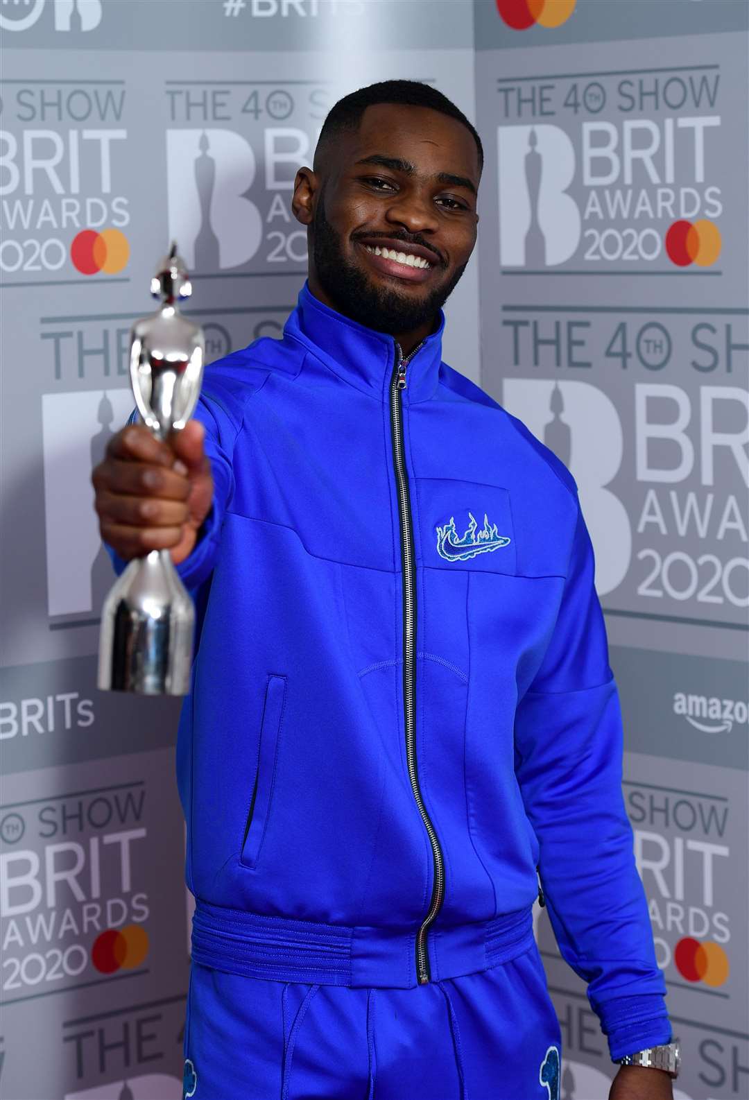 Dave with the Brit Award for Best British Album (Ian West/PA)