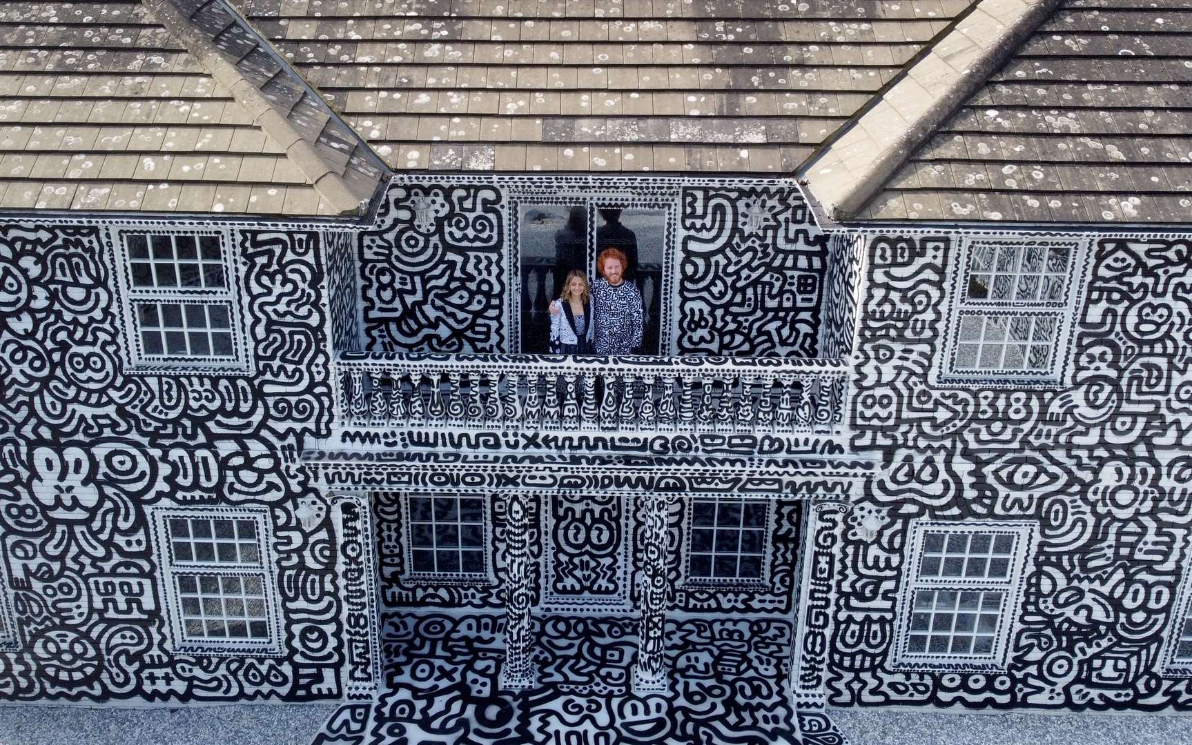 Sam Cox previously covered a mansion in doodles (Gareth Fuller/PA)