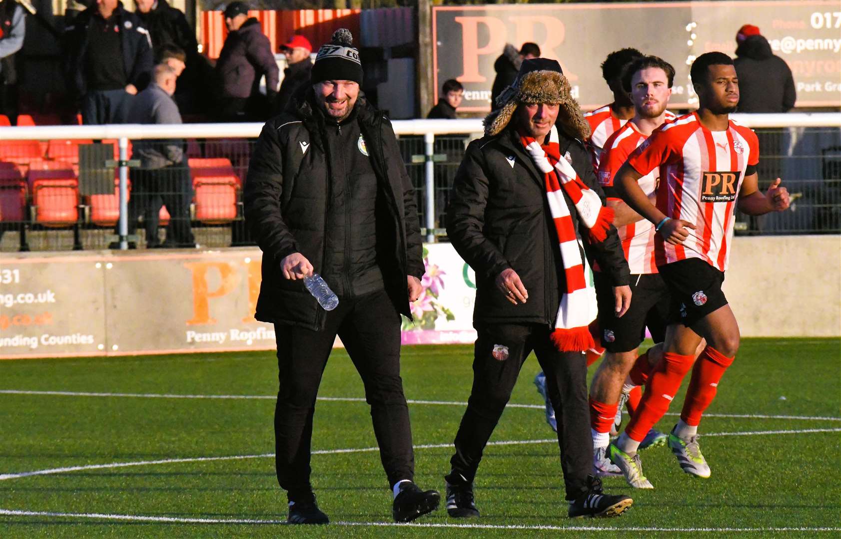 Sheppey boss Ernie Batten, right, and Ashford manager Danny Kedwell share a joke before kick-off. Picture: Marc Richards