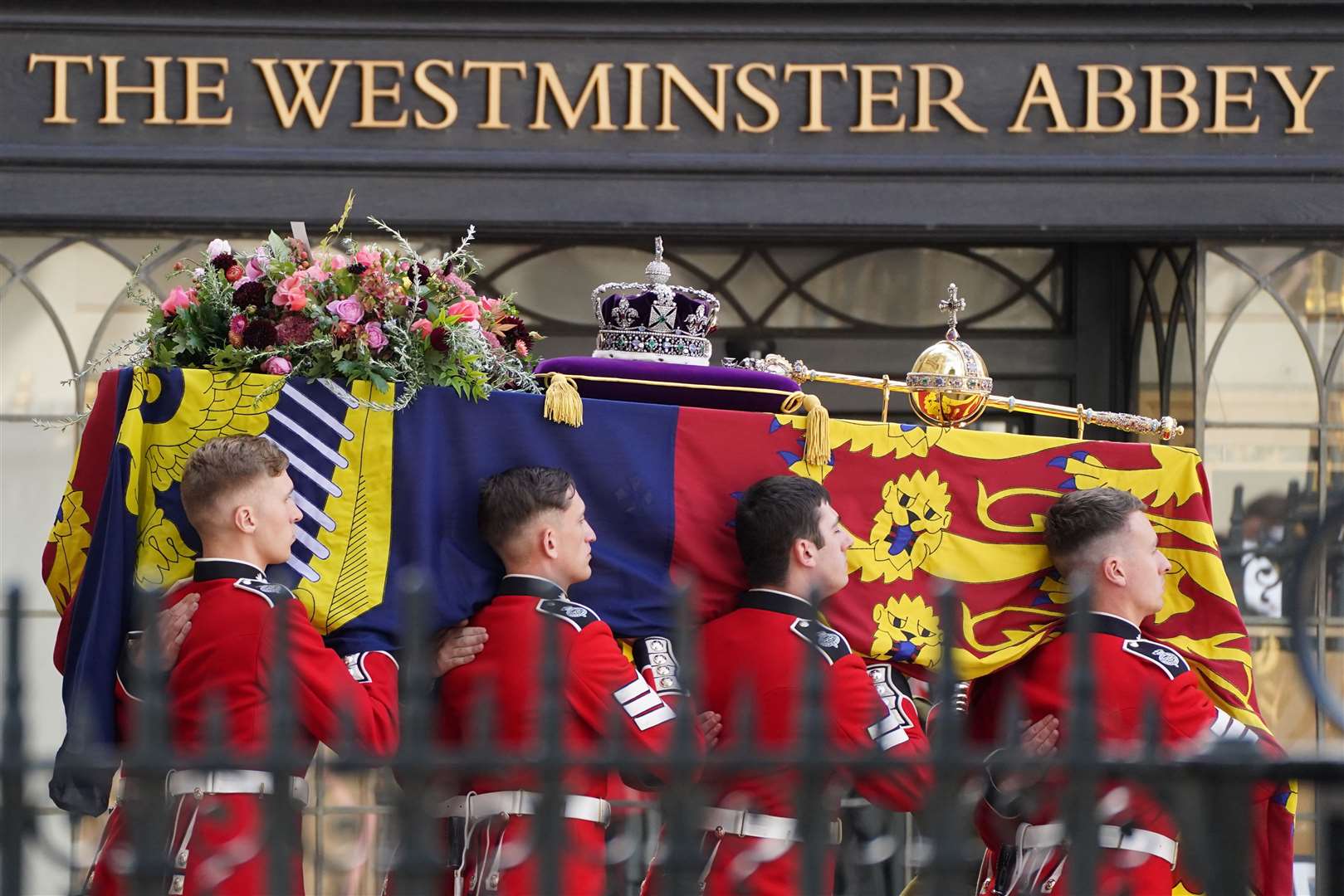 The coffin of the late Queen in the ceremonial procession following her state funeral (James Manning/PA)