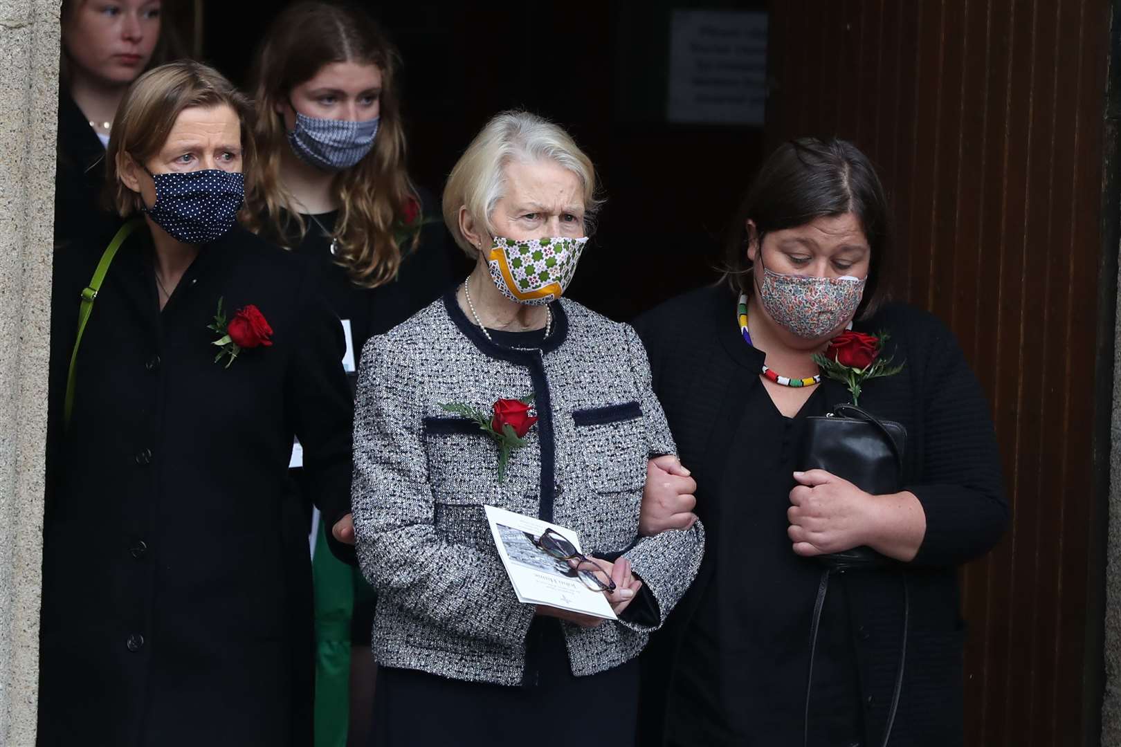 Pat Hume (centre), the widow of the former SDLP leader John Hume leaves St Eugene’s Cathedral (Niall Carson/PA)