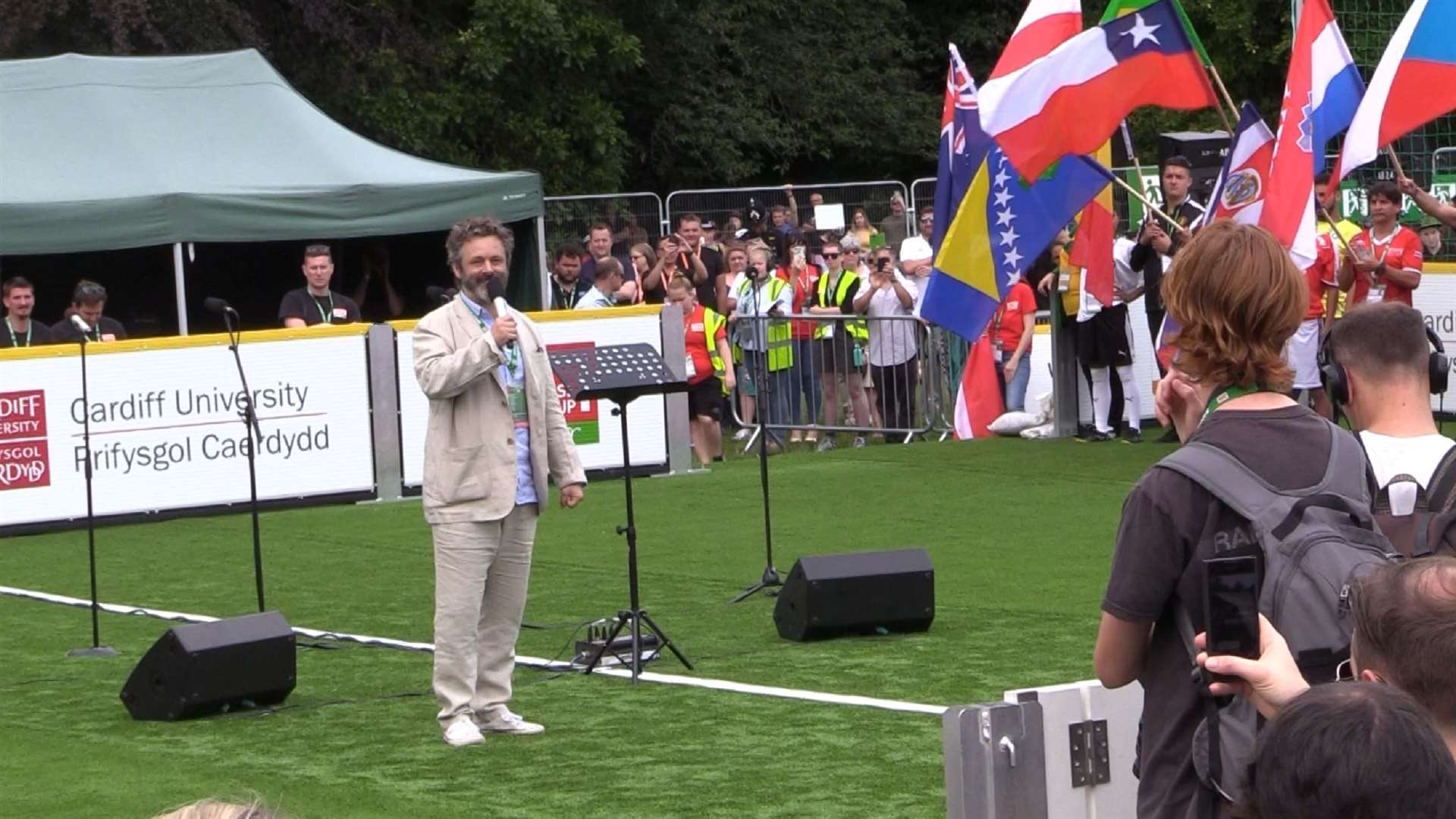 Michael Sheen delivers an address at the opening of the 2019 Homeless World Cup in Cardiff (Max McLean/PA)