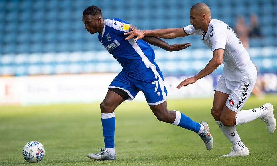 Gillingham striker Brandon Hanlan gets away from his man Picture: Ady Kerry (14058441)