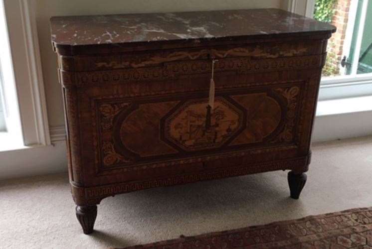 The stolen walnut commode