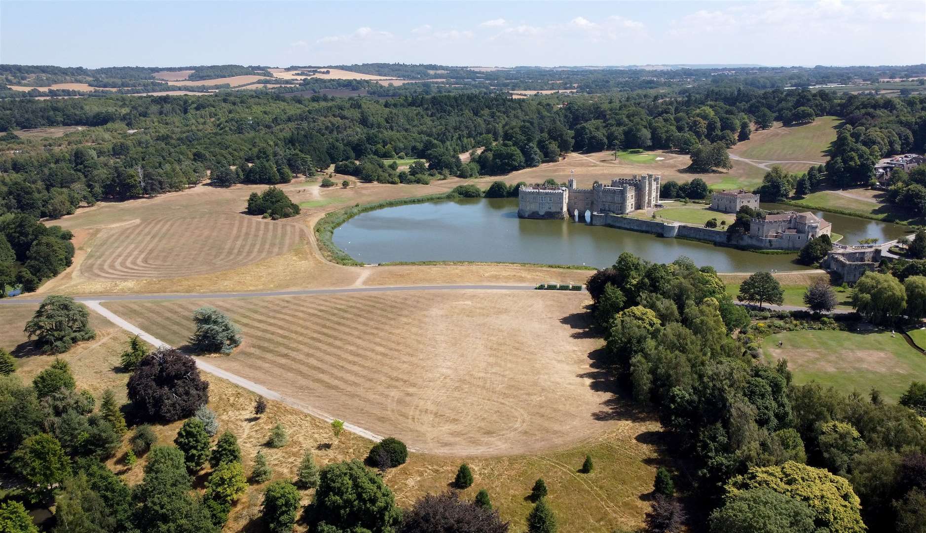 Leeds Castle, usually in green surroundings, had a parched look (Gareth Fuller/PA)