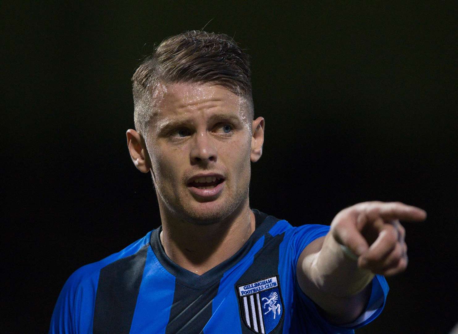 Gillingham's Mark Byrne points the way forward. Picture: Ady Kerry