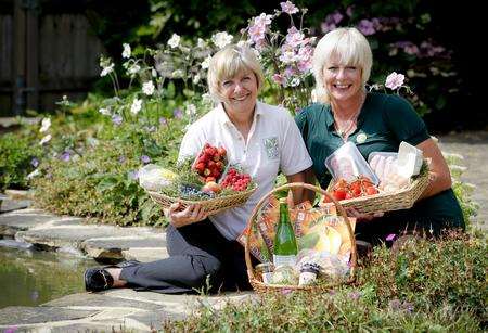 1. Stephanie Durling of Produced in Kent, left, and Liz Sibilia, Visit Kent, with some of the local produce that could be used in a Kent Breakfast.