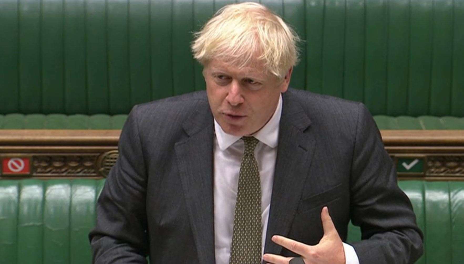 Prime Minister Boris Johnson speaks during Prime Minister’s Questions (House of Commons/PA)