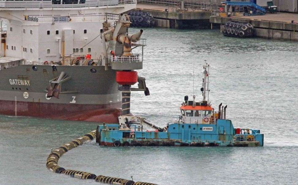 The small blue vessel Jif Worker, which connects piping to the large Gateway dredger. Picture: Dover Strait Shipping - FotoFlite