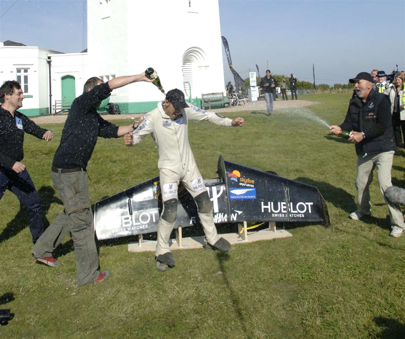 Jetman Yves Rossy enjoys the celebrations after his Channel crossing