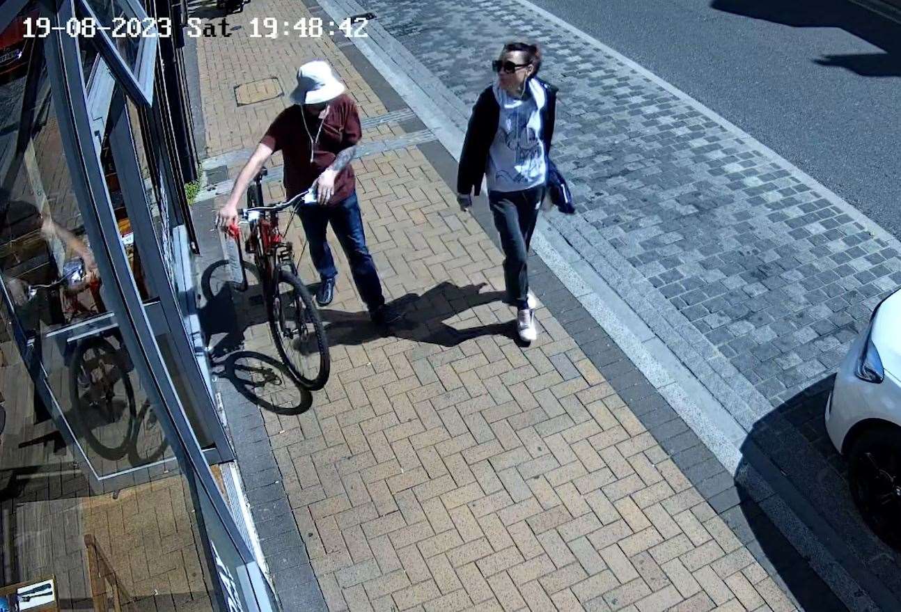 Benjamin Atkins and Debbie Pereira seen on CCTV walking with a hacksaw (Crown Prosecution Service/PA)