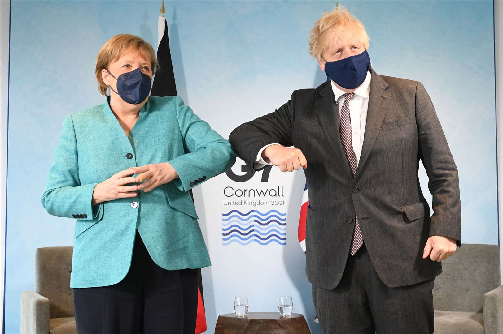 German Chancellor Angela Merkel with Prime Minister Boris Johnson ahead of talks at the summit (Stefan Rousseau/PA)