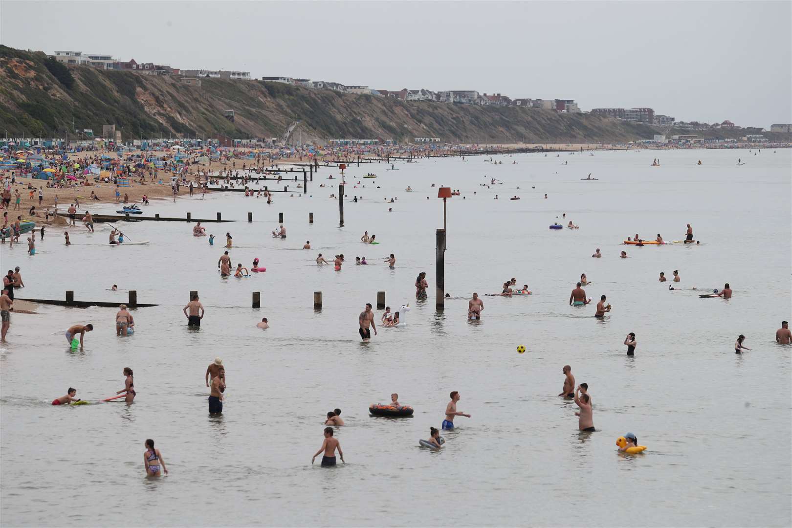 Swimming in the sea at Boscombe beach in Dorset (Andrew Matthews/PA)