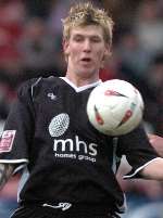 Dean Beckwith in action for Gillingham last season