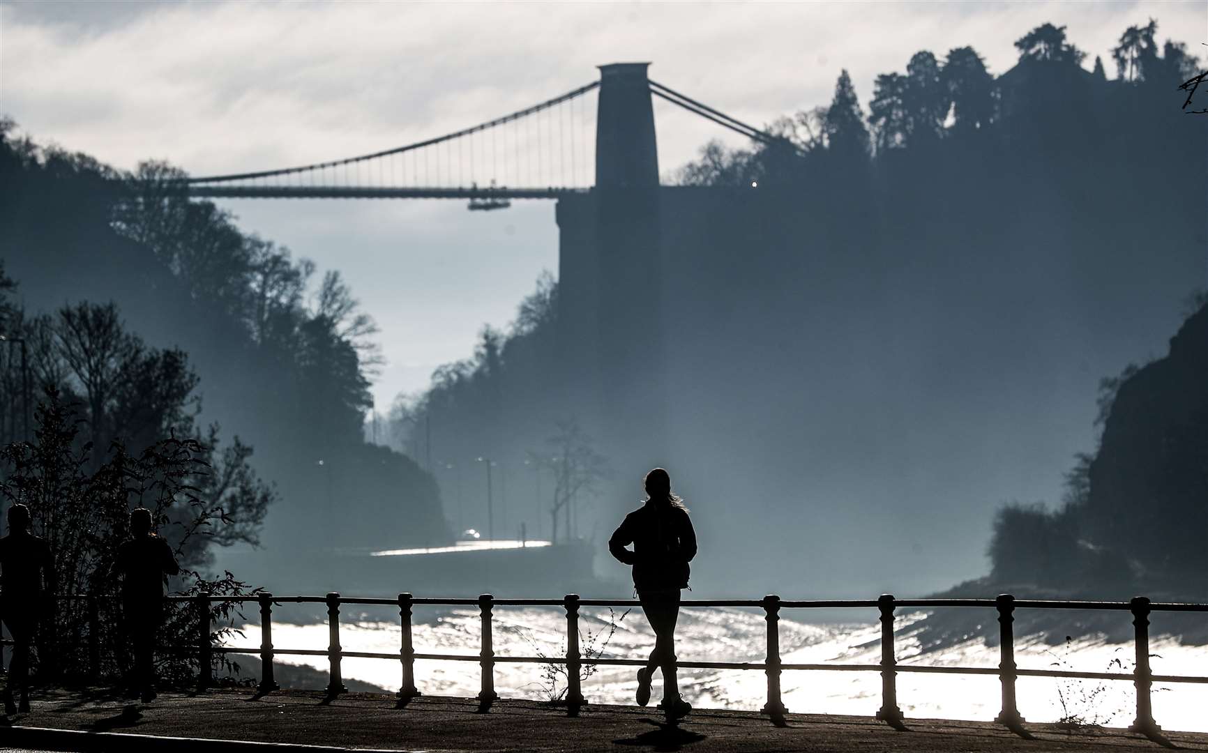 Jogging along the River Avon in Bristol (David Davies/PA)