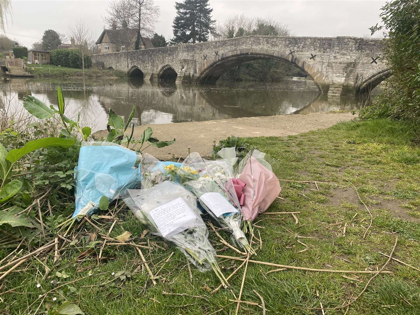 Tributes by the River Medway in Aylesford left for missing teenager Ryan Hughes