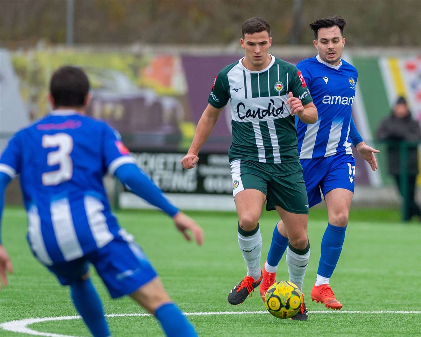 Ashford defender Will Moses carries the ball forward against East Grinstead. Picture: Ian Scammell