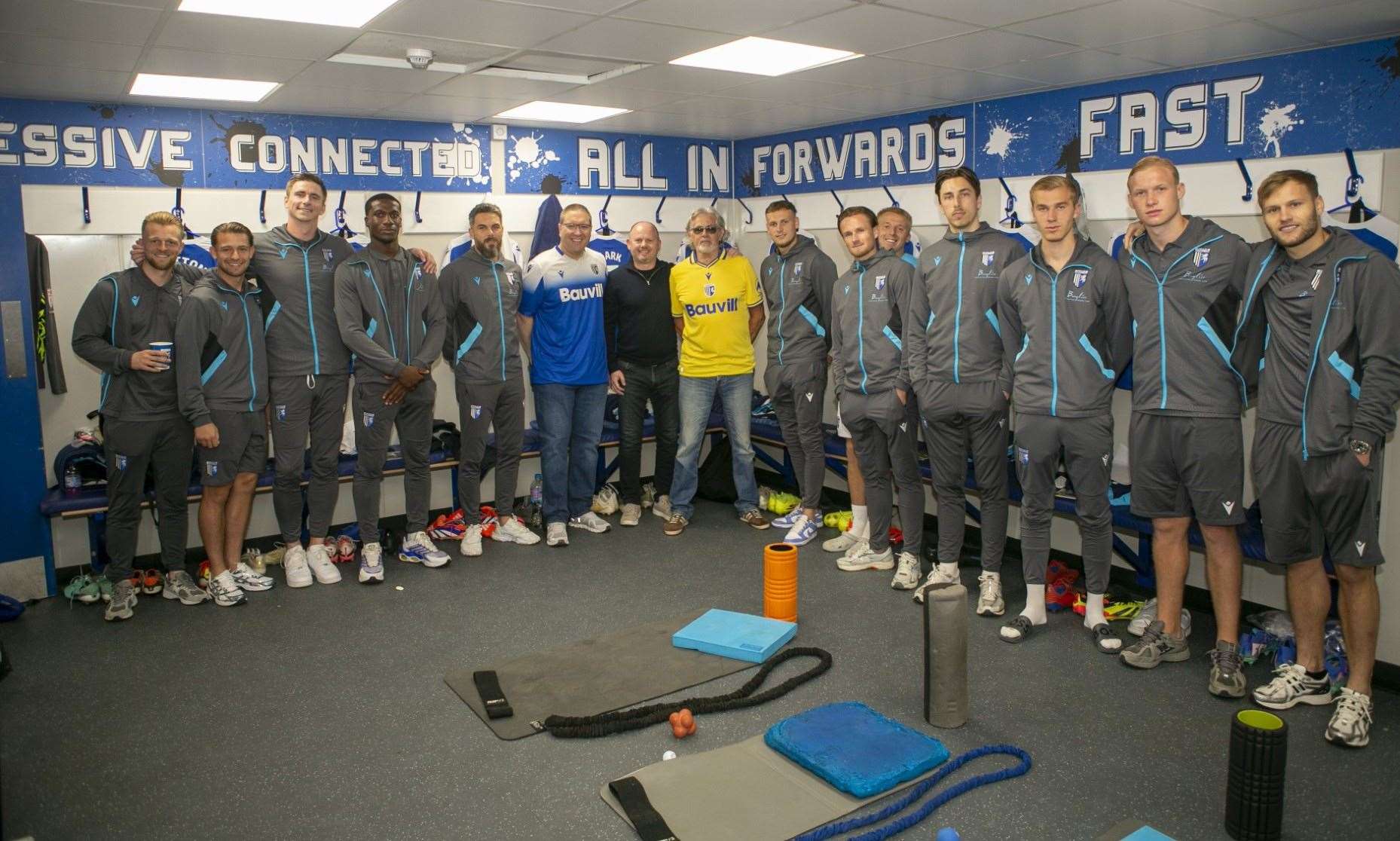 Members of the Gillingham squad before a recent home game are joined by GFCSC committee members Keith Pestell, Darren Smart and media officer David Garth