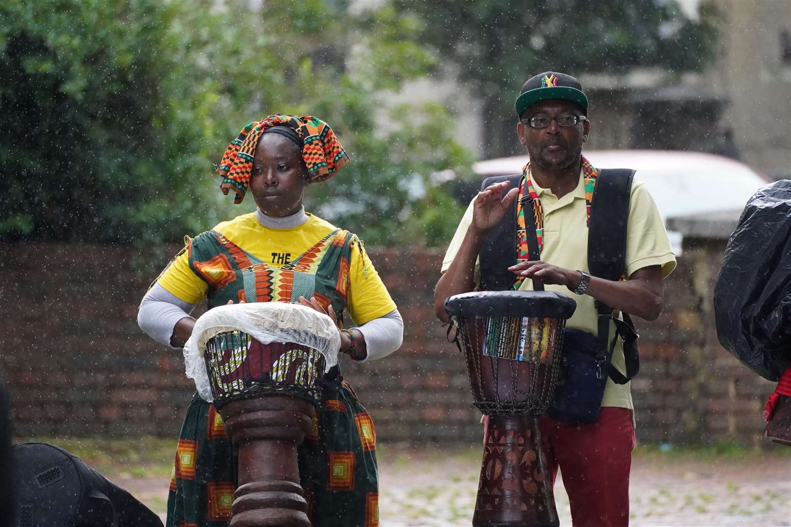 People played drums during the event in Max Roach park. (Steve Parsons/PA)