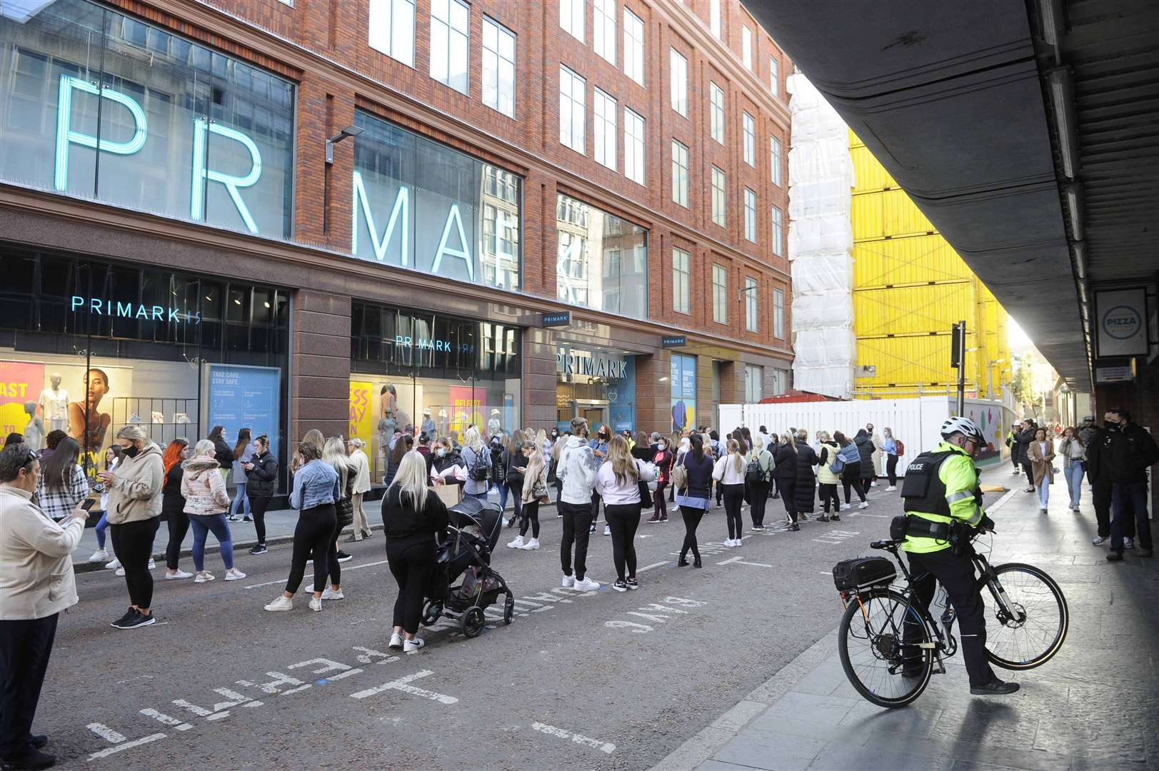 Shoppers queue outside Primark in Belfast (Mark Marlow/PA)