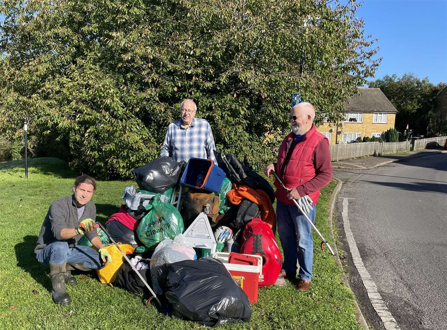 From left, Cllrs Tony Harwood, Ian Chittenden and Mike Thompson with the litter they collected