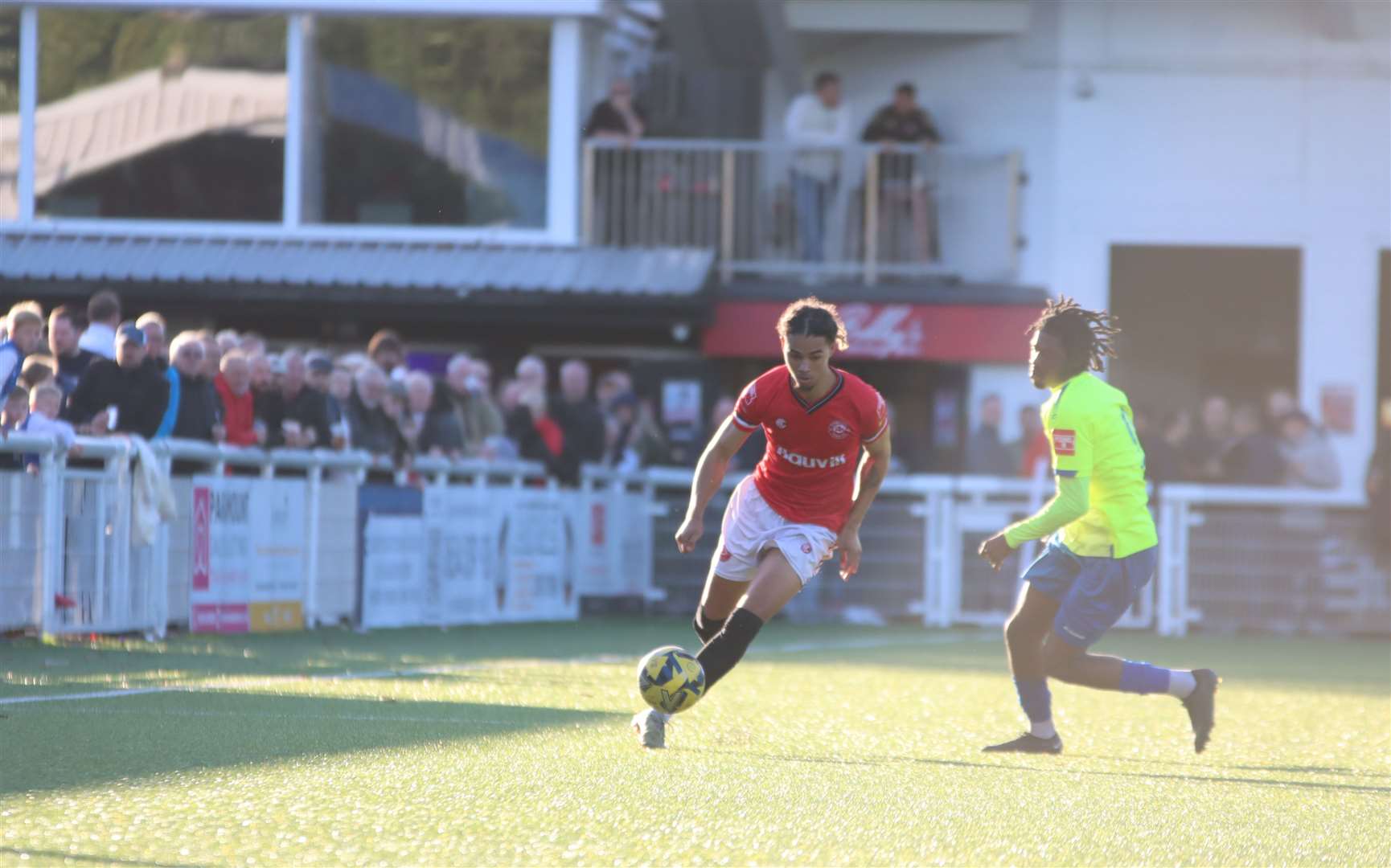 Chatham substitute Che Krabbendam attacking on the right infront of another big crowd at the Bauvill Stadium Picture: Max English @max_ePhotos