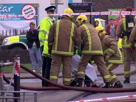 The emergency services busy at the scene. Pictures: MIKE PETT