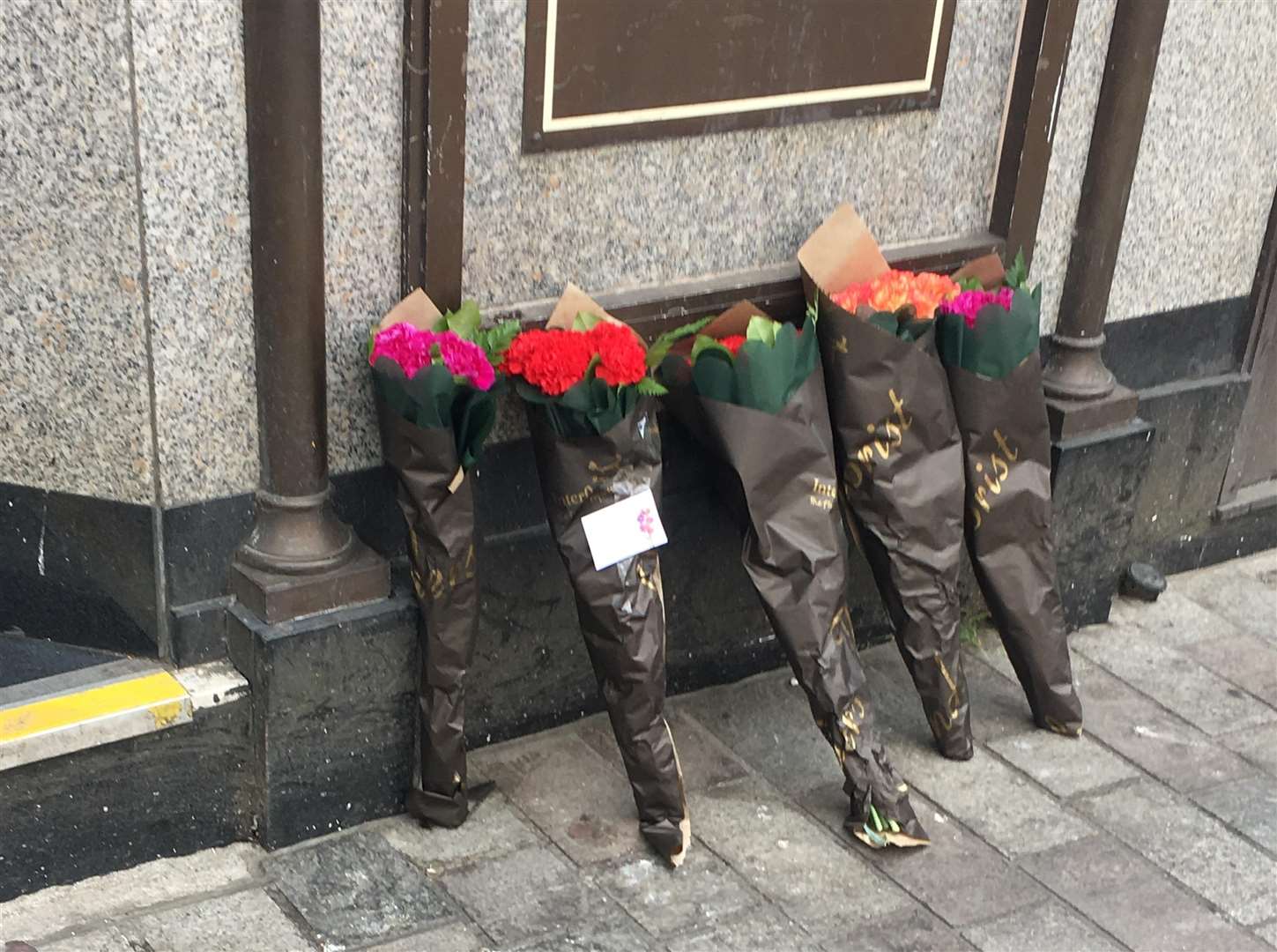 Flowers left in Jubilee Square where a man was found dead.