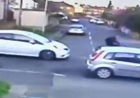 CCTV shows a white car approach cyclist Skye Finley before the collision
