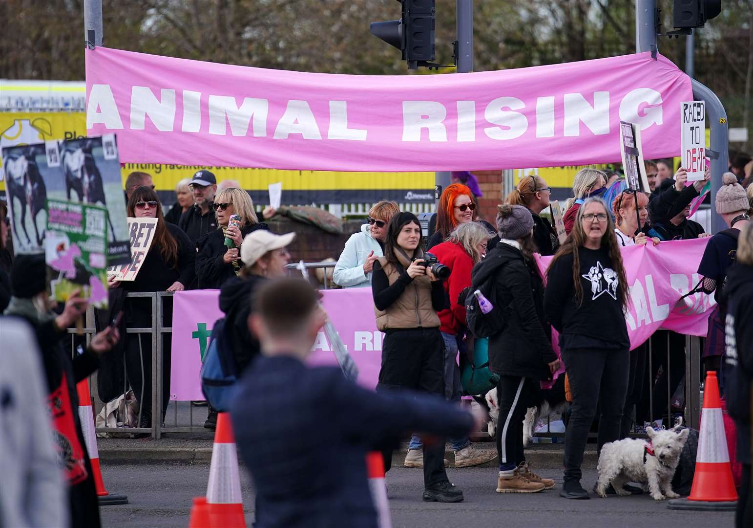 Animal Rising activists outside the gates of Aintree (Peter Byrne/PA)