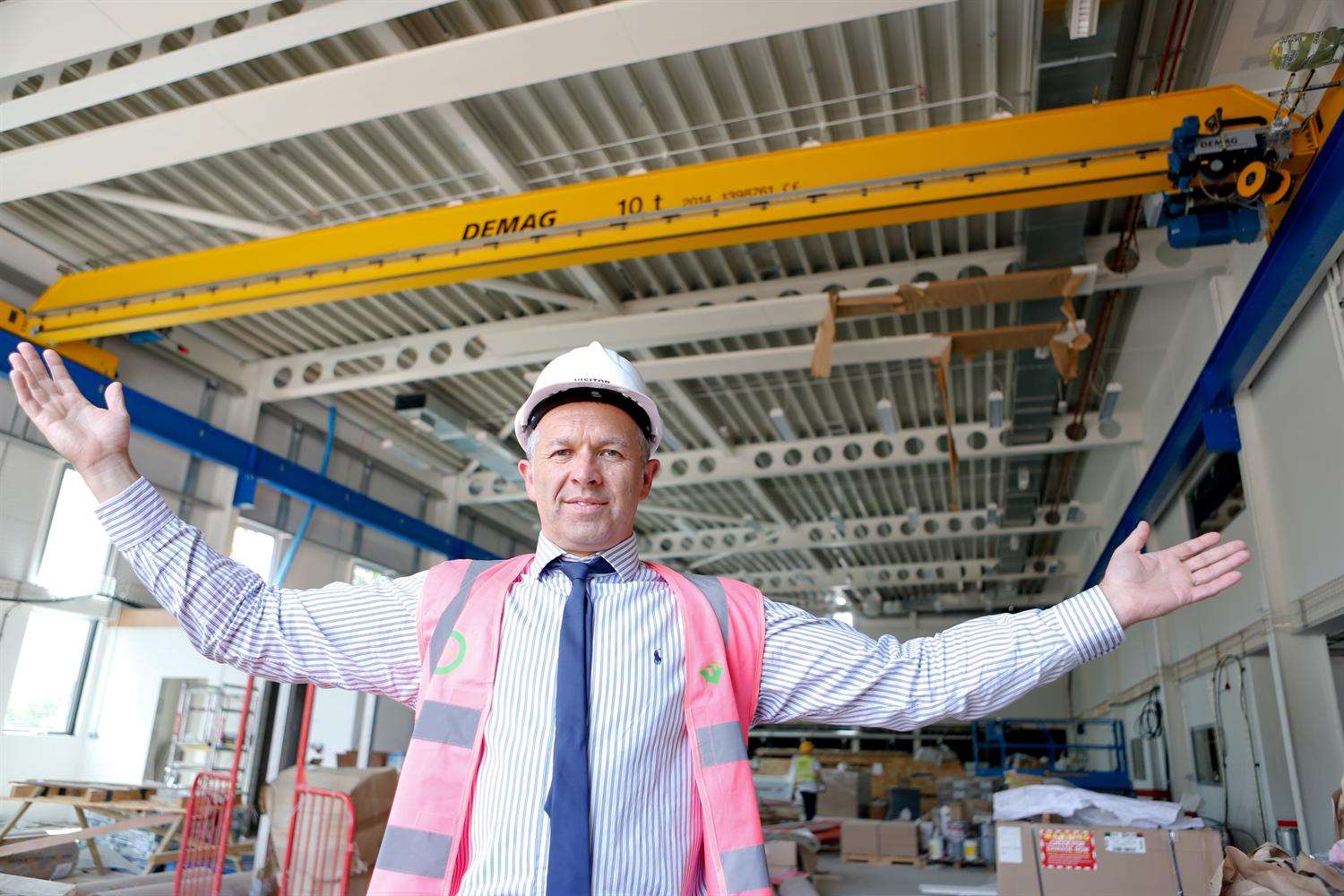 Principal Steve Leahey shows off the huge 10-ton crane at Leigh UTC