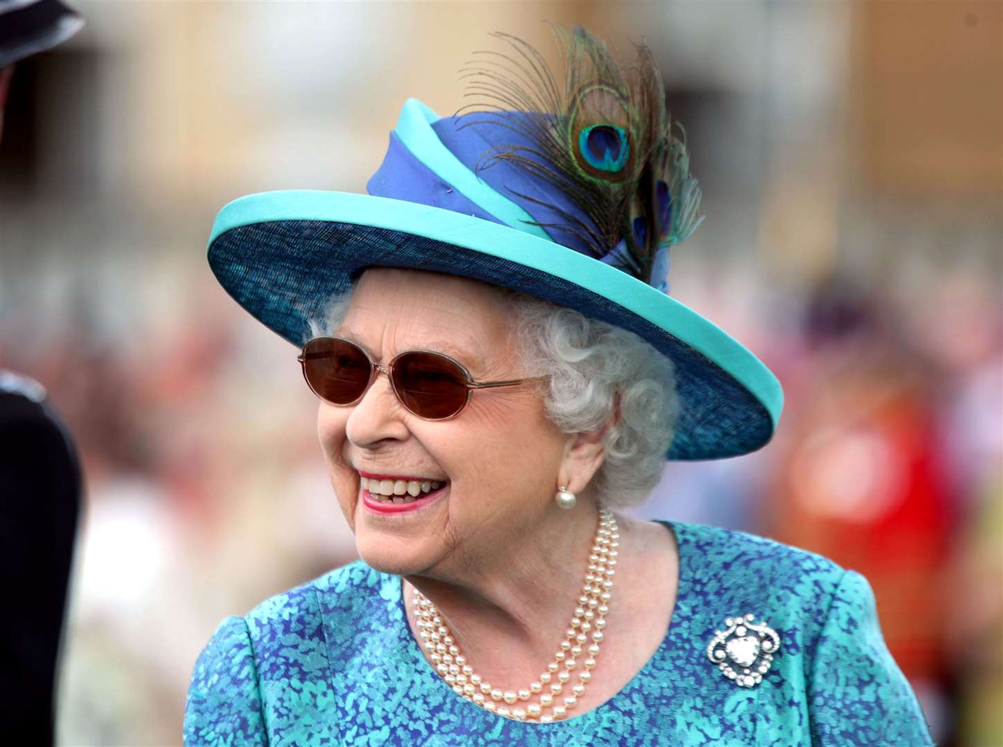 The Queen at a garden party at Buckingham Palace in London in May 2018 (Yui Mok/PA)