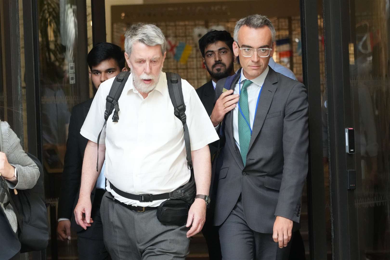 Gareth Jenkins (left), former senior engineer at Fujitsu Services Ltd, leaves after giving evidence to the Post Office Horizon IT inquiry on Tuesday (Jeff Moore/PA)