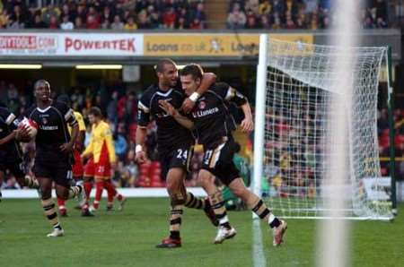 LATE POINT: Darren Ambrose celebrates his 88th minute equaliser. Picture: MATT WALKER