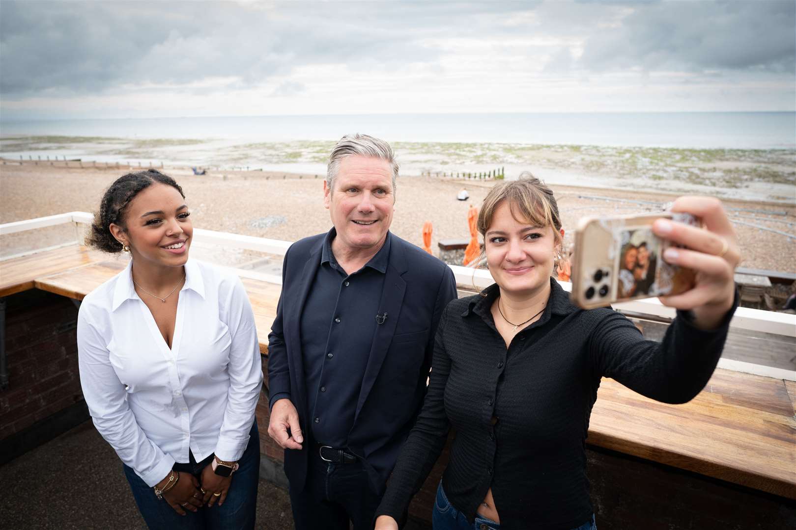 Labour leader Sir Keir Starmer speaks to residents about the impact of the cost of living crisis and rising mortgage rates during a visit to Worthing (Stefan Rousseau/PA)