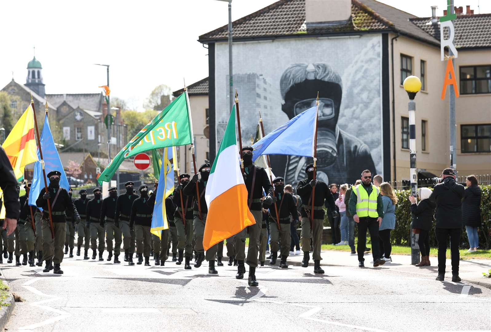 Saoradh Colour Party marches from Free Derry corner to the City Cemetery in Londonderry (Liam McBurney/PA)