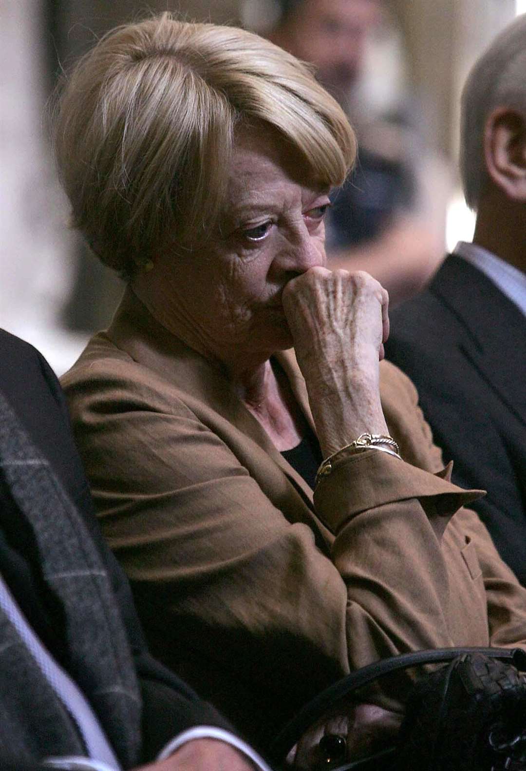 Dame Maggie Smith during a wreath-laying ceremony in Westminster Abbey in 2007 to mark the centenary of the birth of Sir Laurence Olivier (PA)