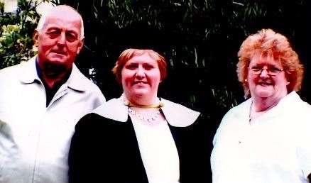 Tracy with parents Roy and Shirley Chilmaid after qualifying as a teacher