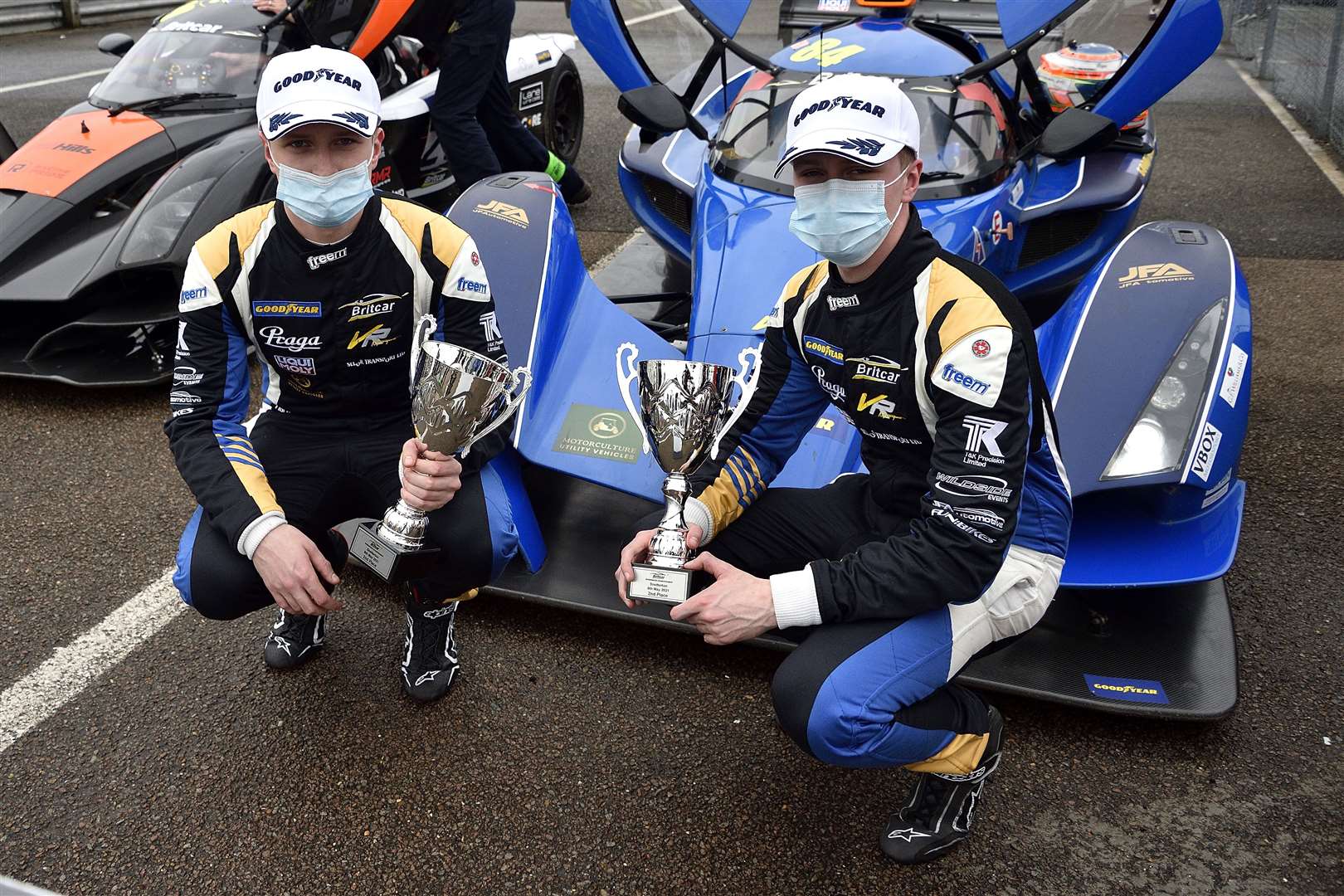 Chris and Ed posing with their trophies. Picture: Dominic Fraser