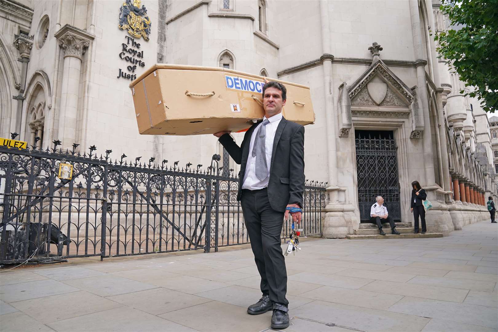 A Ulez protester outside the High Court (Lucy North/PA)