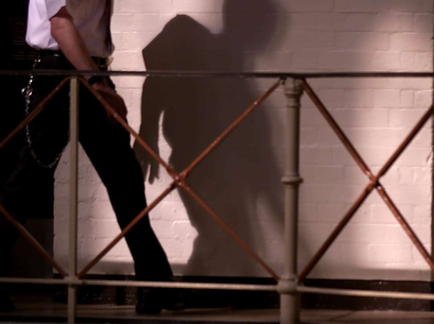 A prison officer patrols the wings of HMP Manchester (Phil Noble/PA)