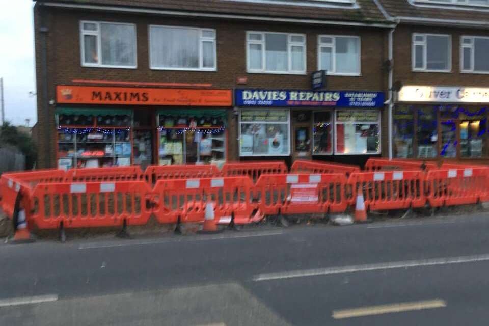 The parking bays outside the shops were blocked