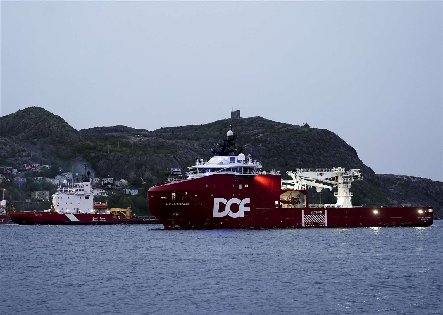 Canadian Coast Guard vessel Terry Fox (left), and Canadian vessel Skandi Vinland (right), return to St John’s Port in Newfoundland, Canada (Jordan Pettit/PA)