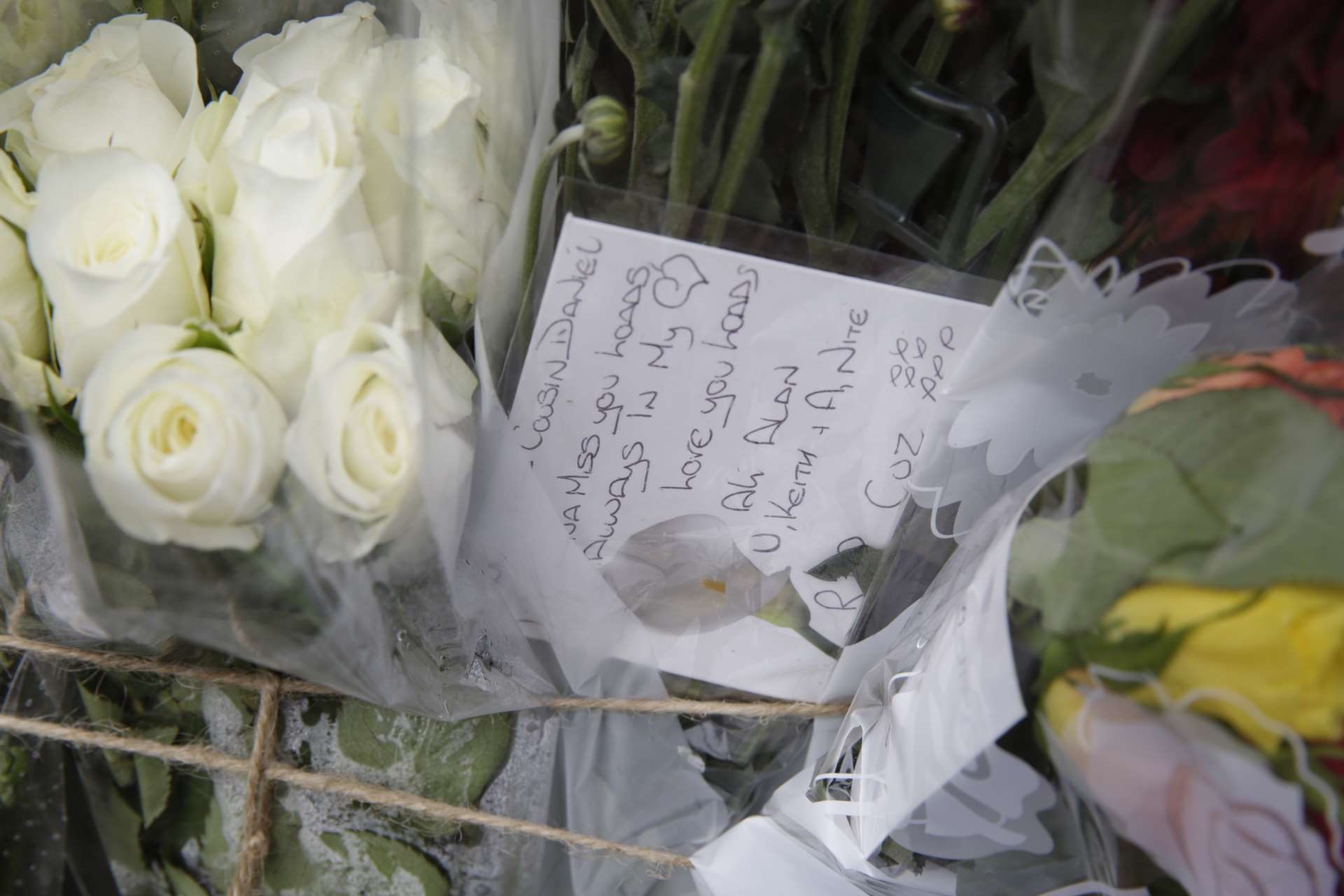 Floral tributes laid at the scene in Capel-le-Ferne. Picture: Martin Apps