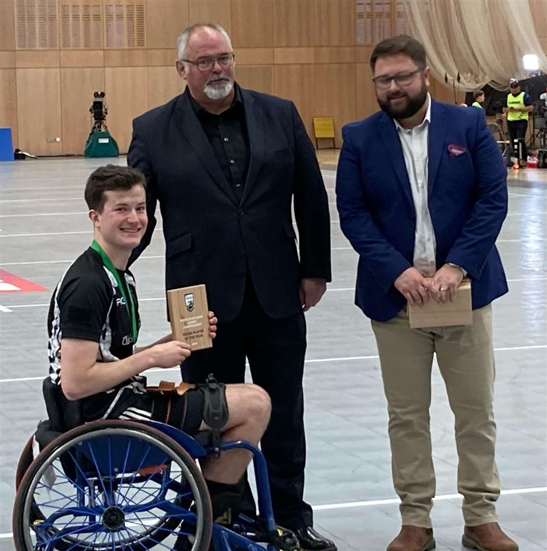 Max Owen is presented with the 2024 National Championship young player-of-the-season award by the RFL's Martin Coyd and Chris Godfrey