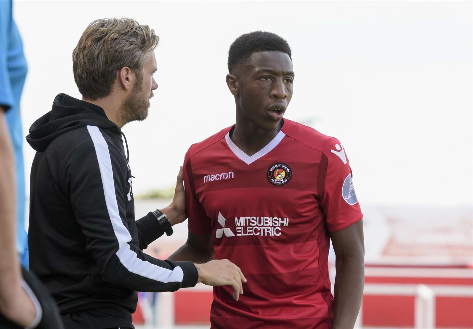 Ebou Adams in conversation with Ebbsfleet boss Daryl McMahon Picture: Andy Payton