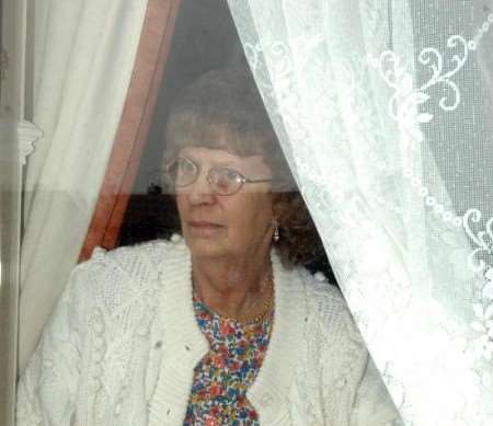 Waiting and hoping - Pat Cameron who longs for the return of her daughter Debbie, pictured below on her wedding day, after nine years