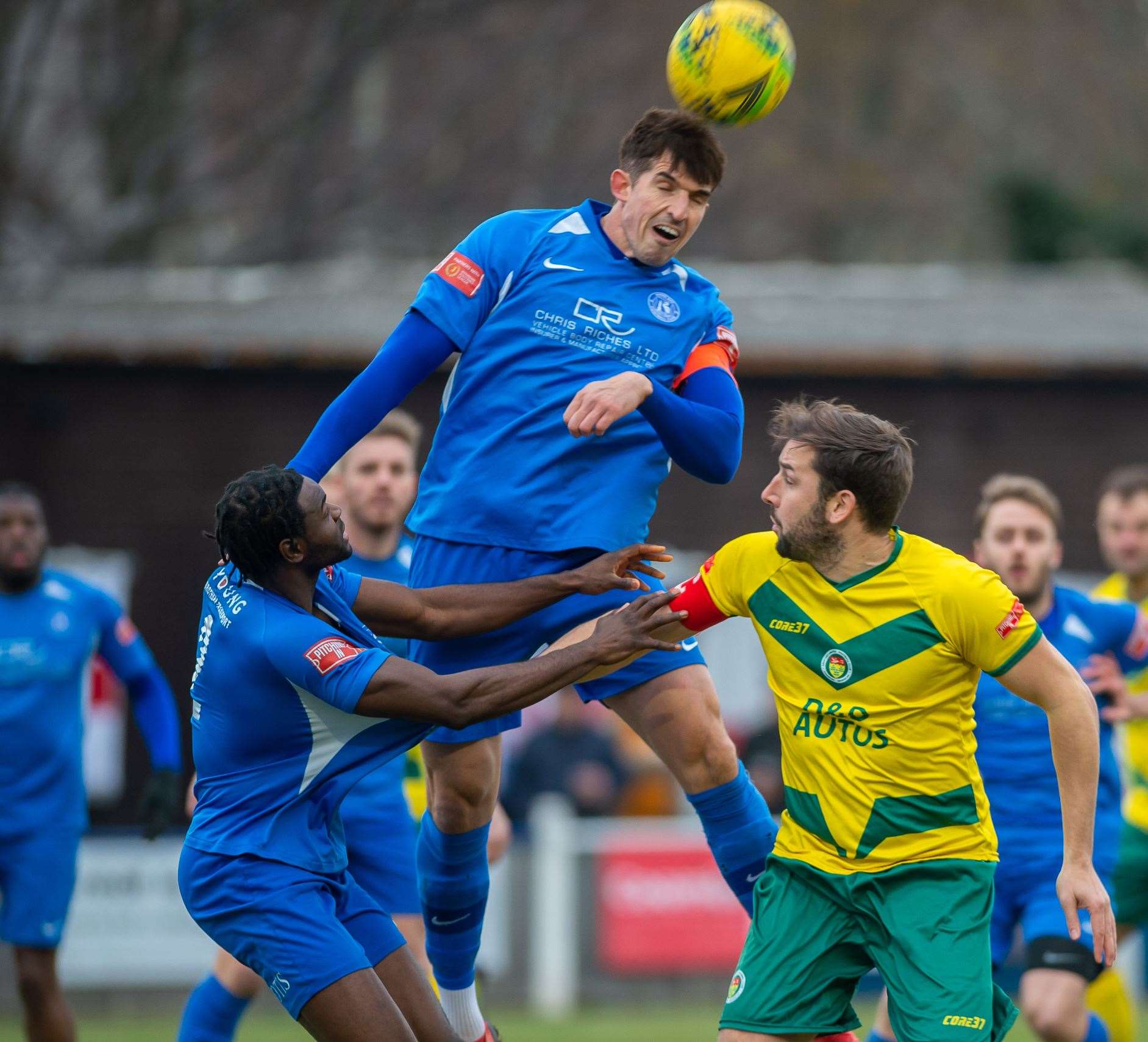 Herne Bay's Jacques Kpohomouh, left, in the thick of the action alongside Ashford defender Liam Friend and Herne Bay captain Laurence Harvey during Bay's recent home defeat. Picture: Ian Scammell