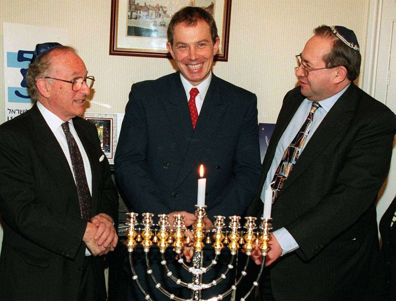 Tony Blair nominated Greville Janner, left, pictured with Mr Blair and Eldred Tabachuk in 1998, for a peerage (Owen Humphreys/PA)